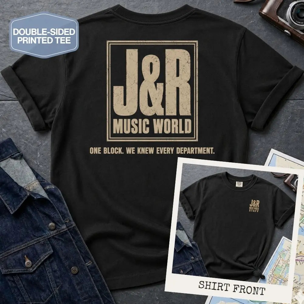 Black Comfort Colors T-shirt with off-white J&R Music World NYC back print and small front chest staff print, shown as a double-sided New York nostalgia tee