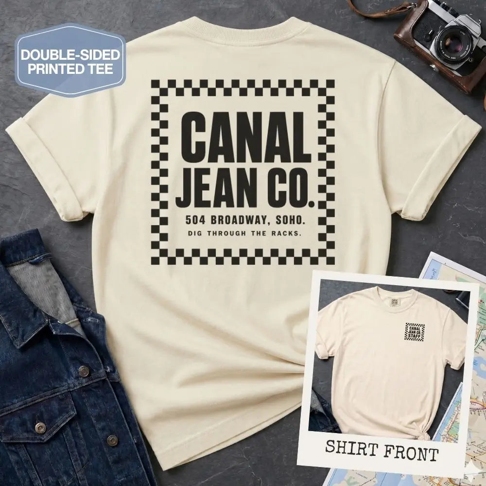 Ivory Comfort Colors T-shirt with black Canal Jean Co. NYC back print and small front chest staff print, shown as a double-sided New York nostalgia tee