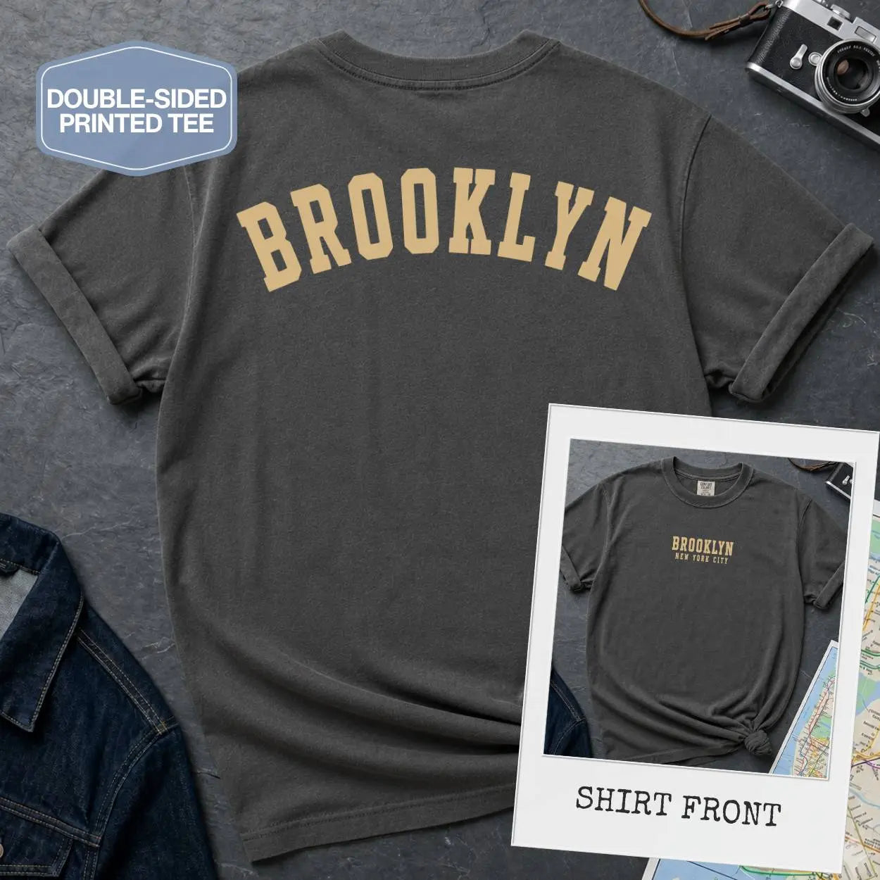 Pepper colored Comfort Colors t-shirt with 'Brooklyn' printed on the back and 'Brooklyn, New York City', displayed on a textured surface.