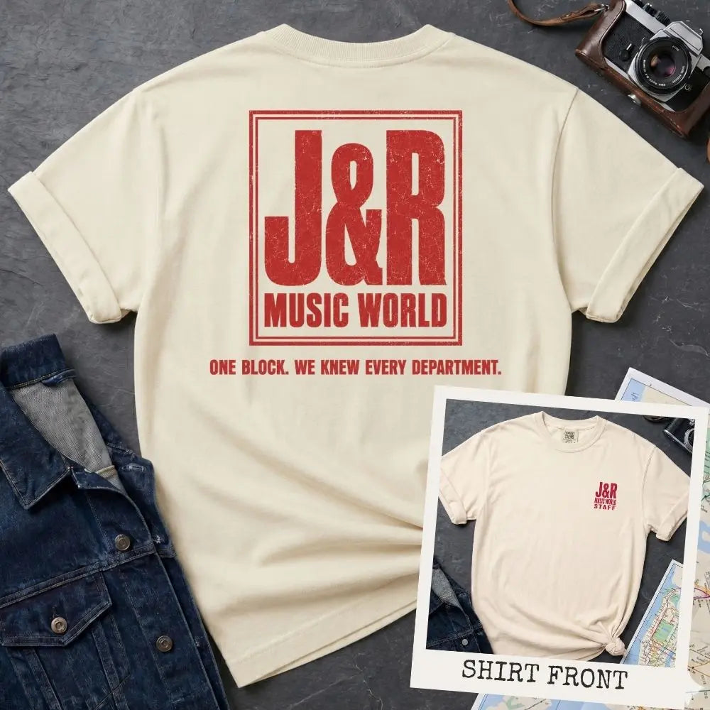 Ivory Comfort Colors T-shirt with red J&R Music World NYC back print and small front chest staff print, shown as a double-sided New York nostalgia tee