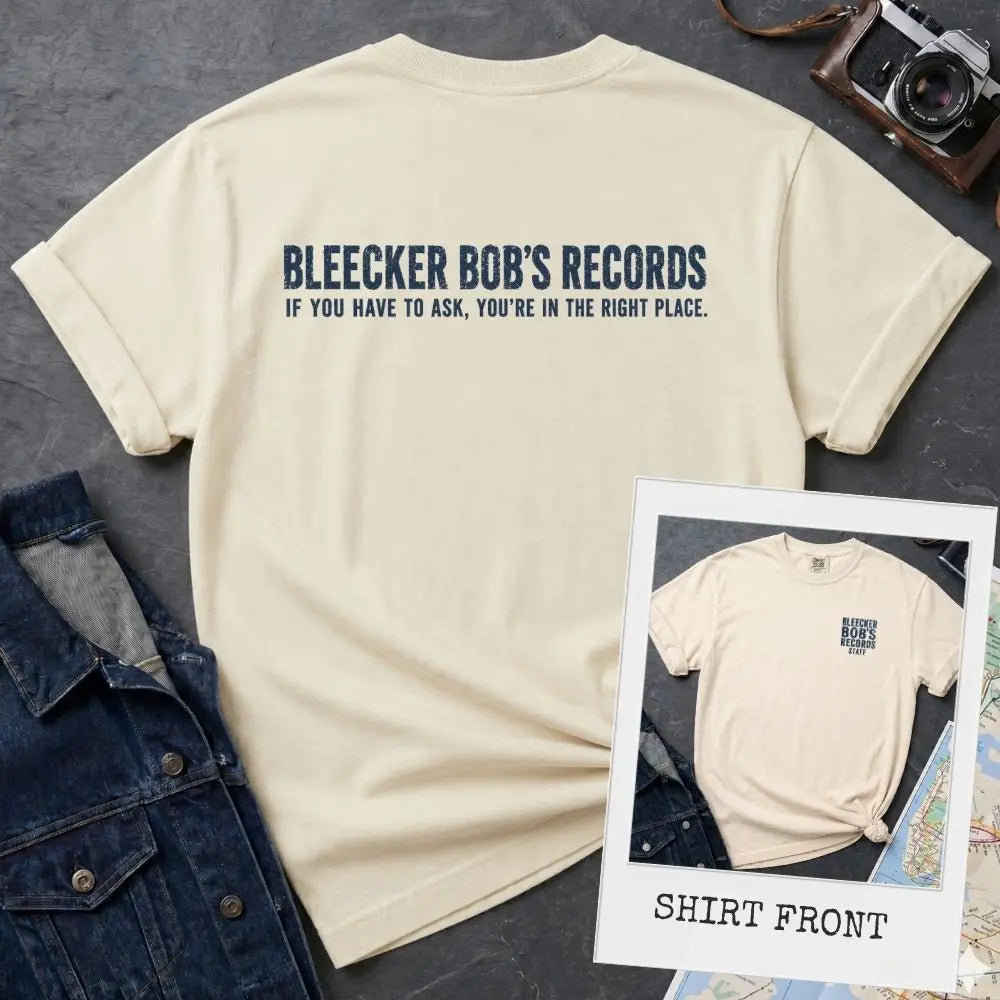 Ivory Comfort Colors T-shirt with blue Bleecker Bob’s Records NYC back print and small front chest print, shown as a double-sided New York nostalgia tee