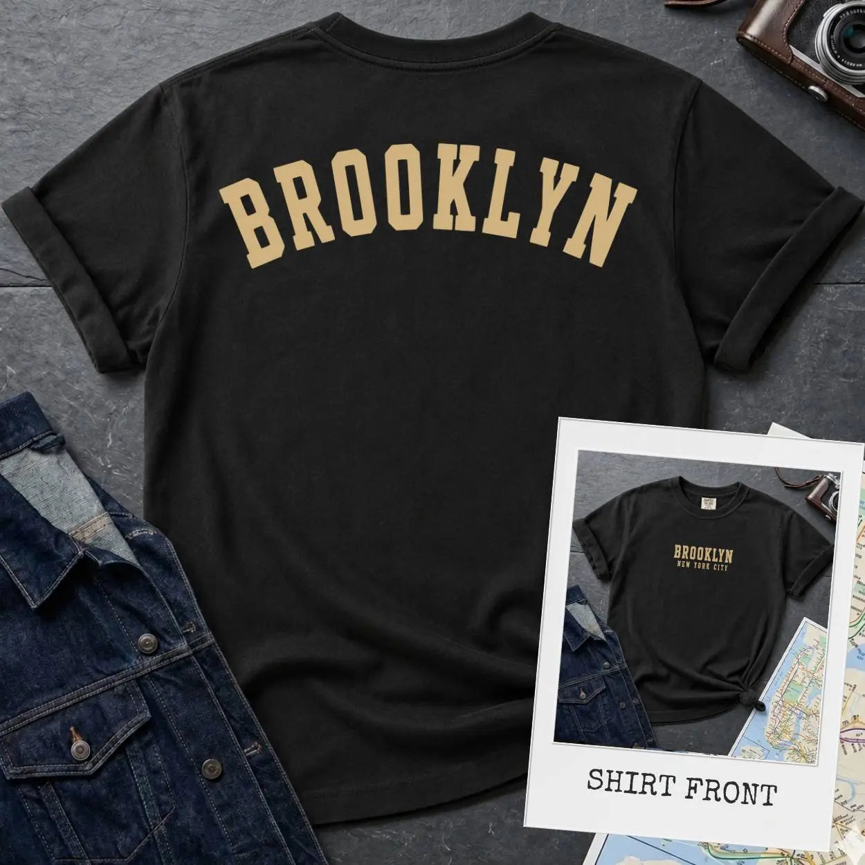 Black Comfort Colors t-shirt with 'Brooklyn' printed on the back and 'Brooklyn, New York City', on a dark surface. 