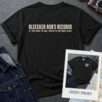 Black Comfort Colors T-shirt with ivory Bleecker Bob’s Records NYC back print and small front chest print, shown as a double-sided New York nostalgia tee