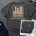 Pepper colored Comfort Colors T-shirt with off-white J&R Music World NYC back print and small front chest staff print, shown as a double-sided New York nostalgia tee