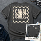 Pepper-colored Comfort Colors T-shirt with off-white Canal Jean Co. NYC back print and small front chest staff print, shown as a double-sided New York nostalgia tee