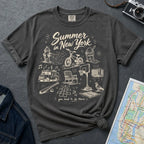 Pepper colored Comfort Colors t-shirt with 'Summer in New York' graphic design on a gray surface with denim jacket and map.