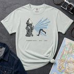 Bay colored Comfort Colors t-shirt featuring a vintage NYC fire hydrant spraying water with “Summer Days • NYC • 1981” text.