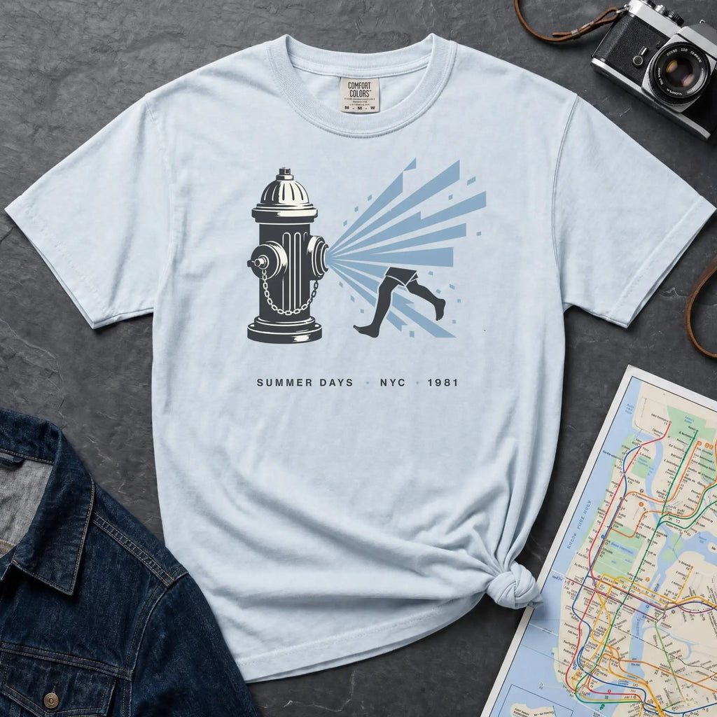Light blue Comfort Colors t-shirt featuring a vintage NYC fire hydrant spraying water with “Summer Days • NYC • 1981” text.