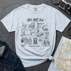 Light Blue Comfort Colors t-shirt featuring an 80’s NYC Kid Starter Pack graphic with hand-drawn New York City icons including Italian ice, a radio, stoop steps, stickball, a fire hydrant, and a pigeon.