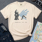 Ivory Comfort Colors t-shirt featuring a vintage NYC fire hydrant spraying water with “Summer Days • NYC • 1981” text.