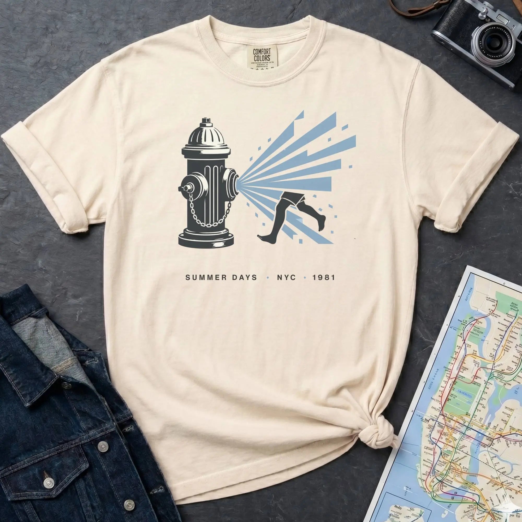 Ivory Comfort Colors t-shirt featuring a vintage NYC fire hydrant spraying water with “Summer Days • NYC • 1981” text.