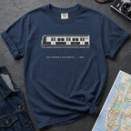 Navy Comfort Colors t-shirt featuring a minimalist New York City subway car graphic with “NYC Transit Authority • 1987” text.