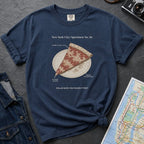 Navy Comfort Colors t-shirt featuring a vintage New York City dollar slice pizza graphic with specimen-style callouts and a folded slice on a paper plate.