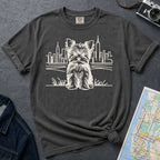 Pepper colored Comfort Colors t-shirt featuring a minimalist Yorkshire Terrier (Yorkie) illustration in front of the New York City skyline.