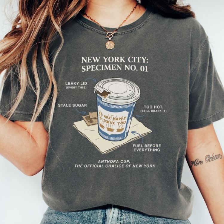 Pepper-colored t-shirt with a vintage specimen diagram of the blue and white Anthora NYC coffee cup labeled Specimen No. 01
