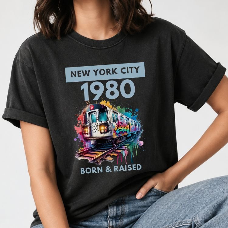 Custom NYC subway graffiti birth year tee with Born & Raised text on a black shirt.