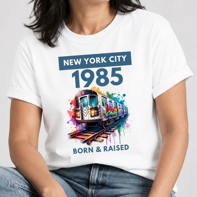 Custom NYC subway graffiti birth year tee with Born & Raised text on a white shirt.