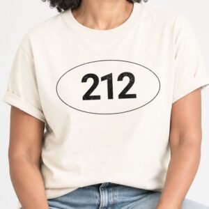 Ivory t-shirt with the NYC 212 area code in distressed numbers inside a thin oval sticker design