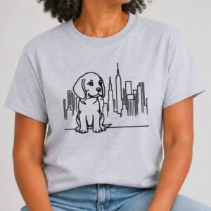 Heather grey t-shirt with black line art of a beagle puppy sitting in front of the NYC skyline and Empire State Building