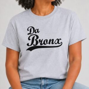 Heather Grey t-shirt with Da Bronx in black vintage baseball script lettering with a swoosh tail underline