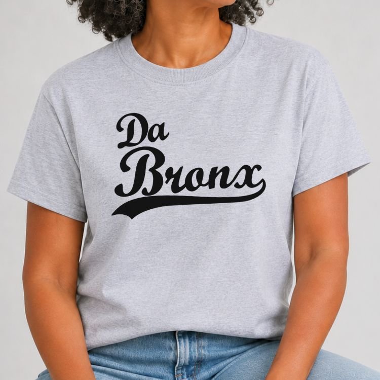 Heather Grey t-shirt with Da Bronx in black vintage baseball script lettering with a swoosh tail underline