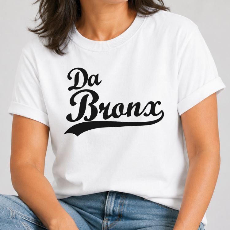 White t-shirt with Da Bronx in black vintage baseball script lettering with a swoosh tail underline